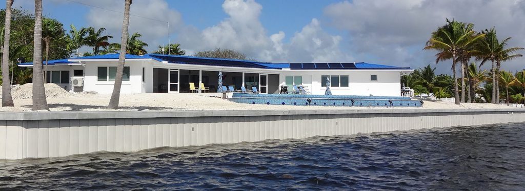 Completed Truline composite seawall protecting a luxury waterfront residence in South Florida